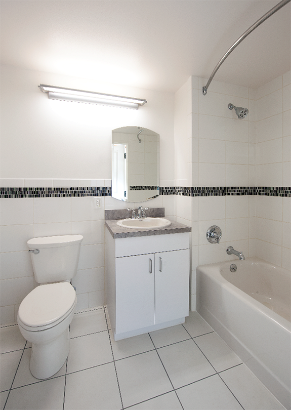 Interior view of pre-fabricated bathroom pods installed at Prospect Plaza